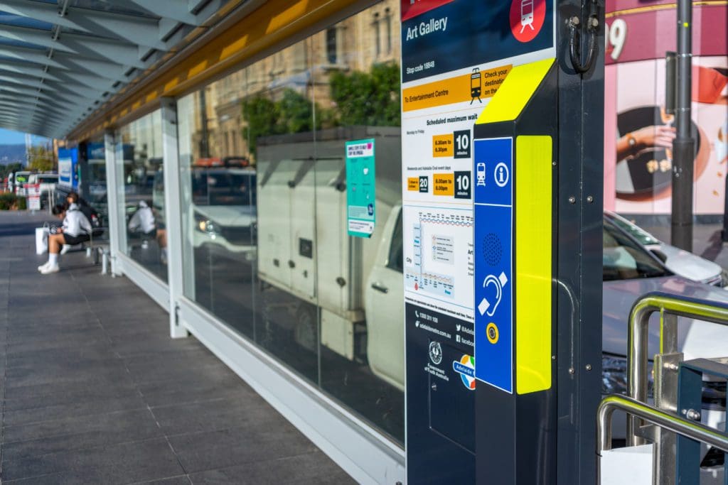 This is an image of a Stand Alone Voice Annunciator & Audio Induction Loop installed at a bus station.