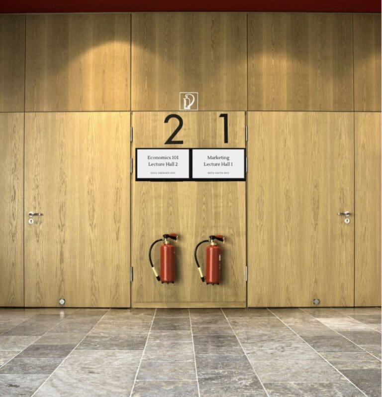 This is an image of an indoor e-paper displays being used to label the entry of two lecture halls from Metrospec's Digital Displays. Digital Signage for Education