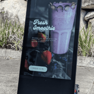 This is an image of Metrospec Portable A Frame Digital Display being used to promote a cafe menu option.